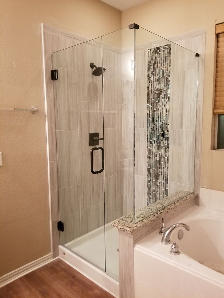 all glass frameless shower on ponywall