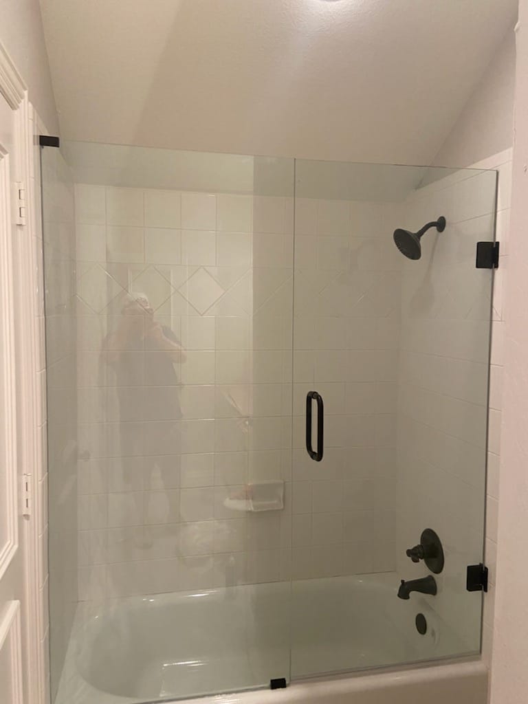 Door and panel glass over bathtub Frisco