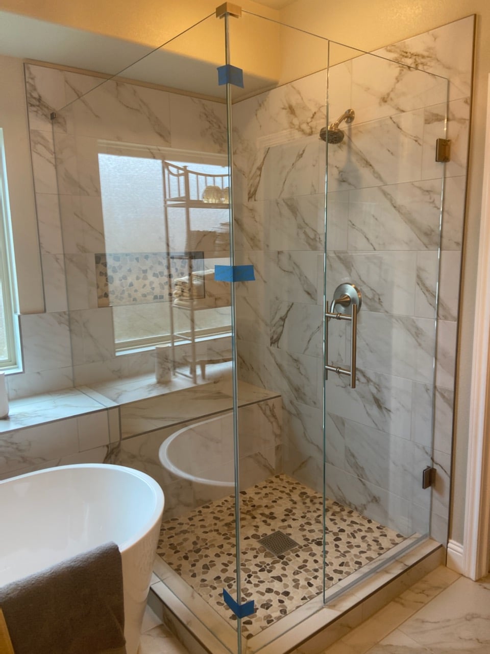 luxury bathroom remodel with custom glass shower