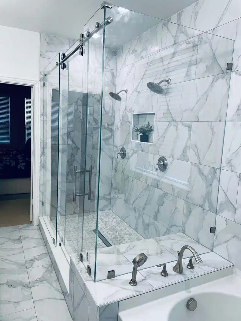large shower with sliding glass