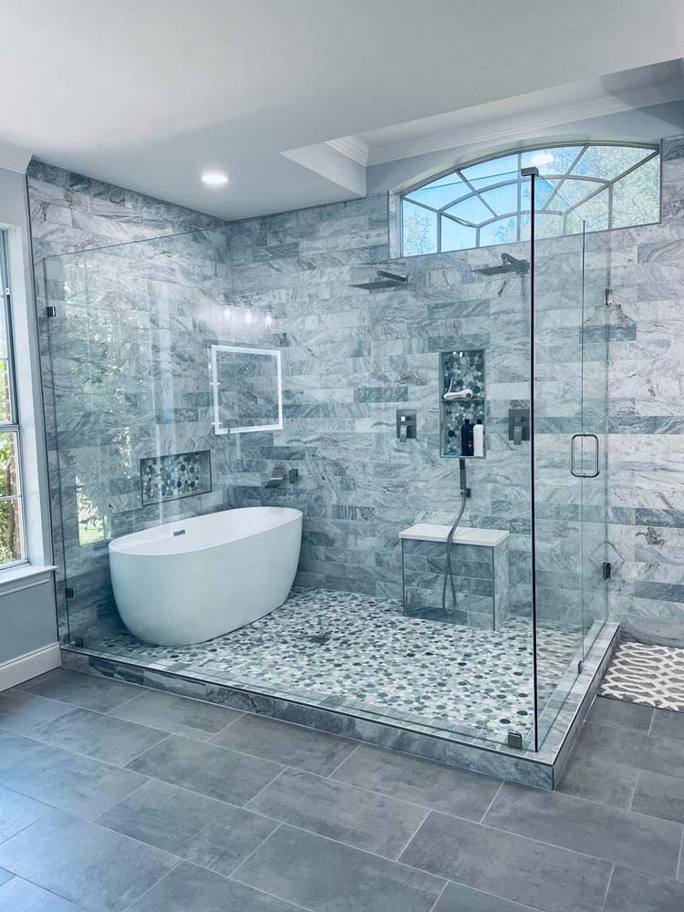 remodeled shower large glass panel